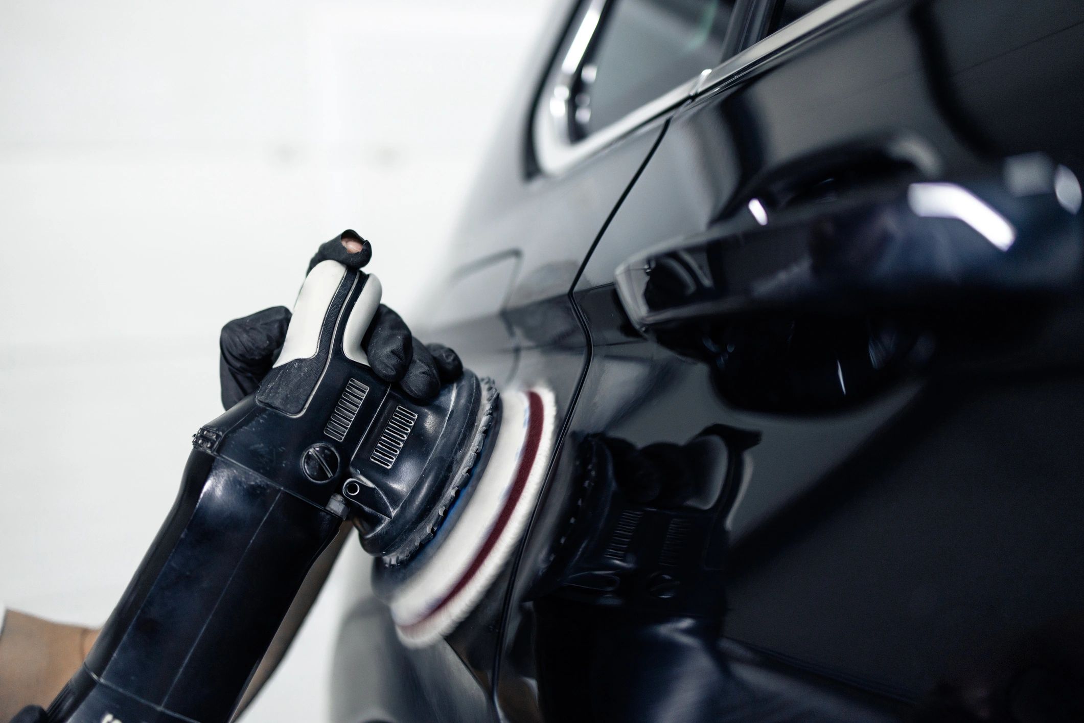 Machine polishing a car panel
